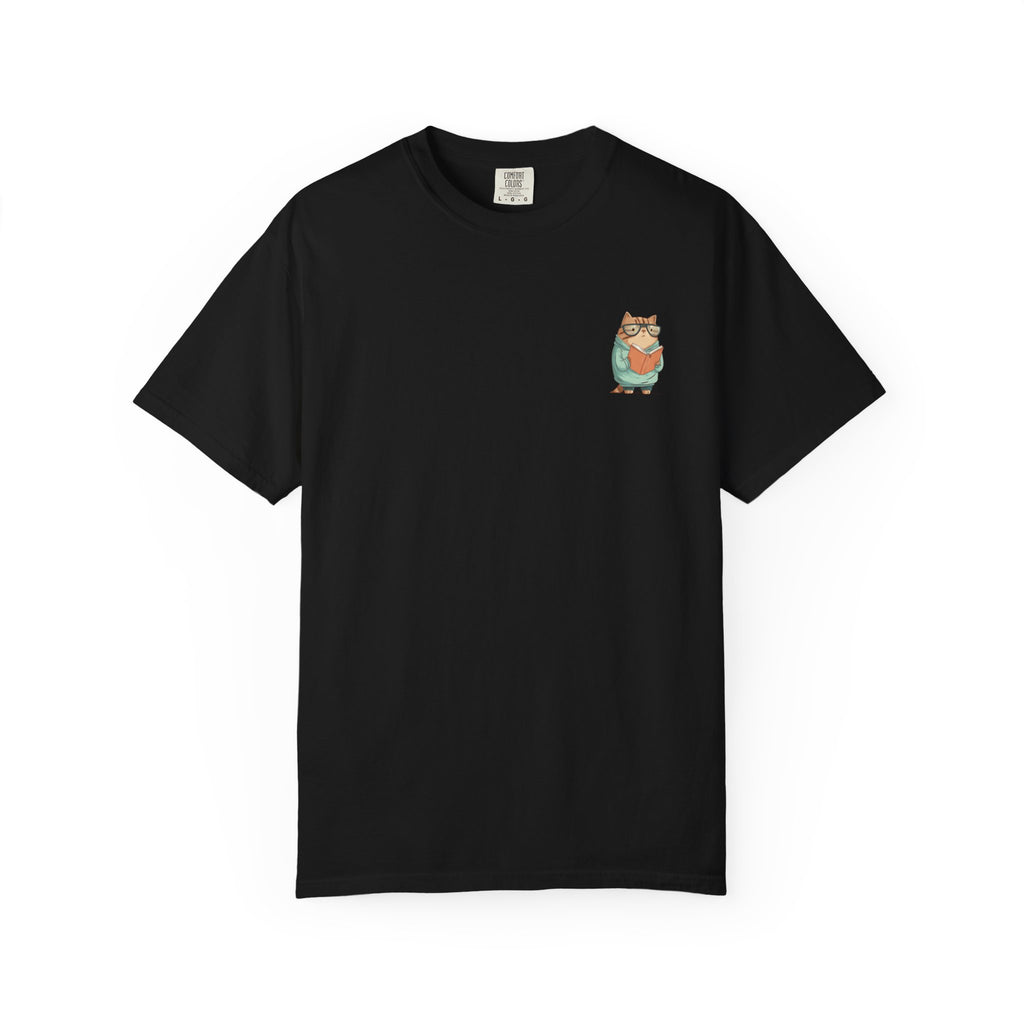 "Black streetwear t-shirt featuring a small graphic print of a cute cat wearing glasses and reading a book." 