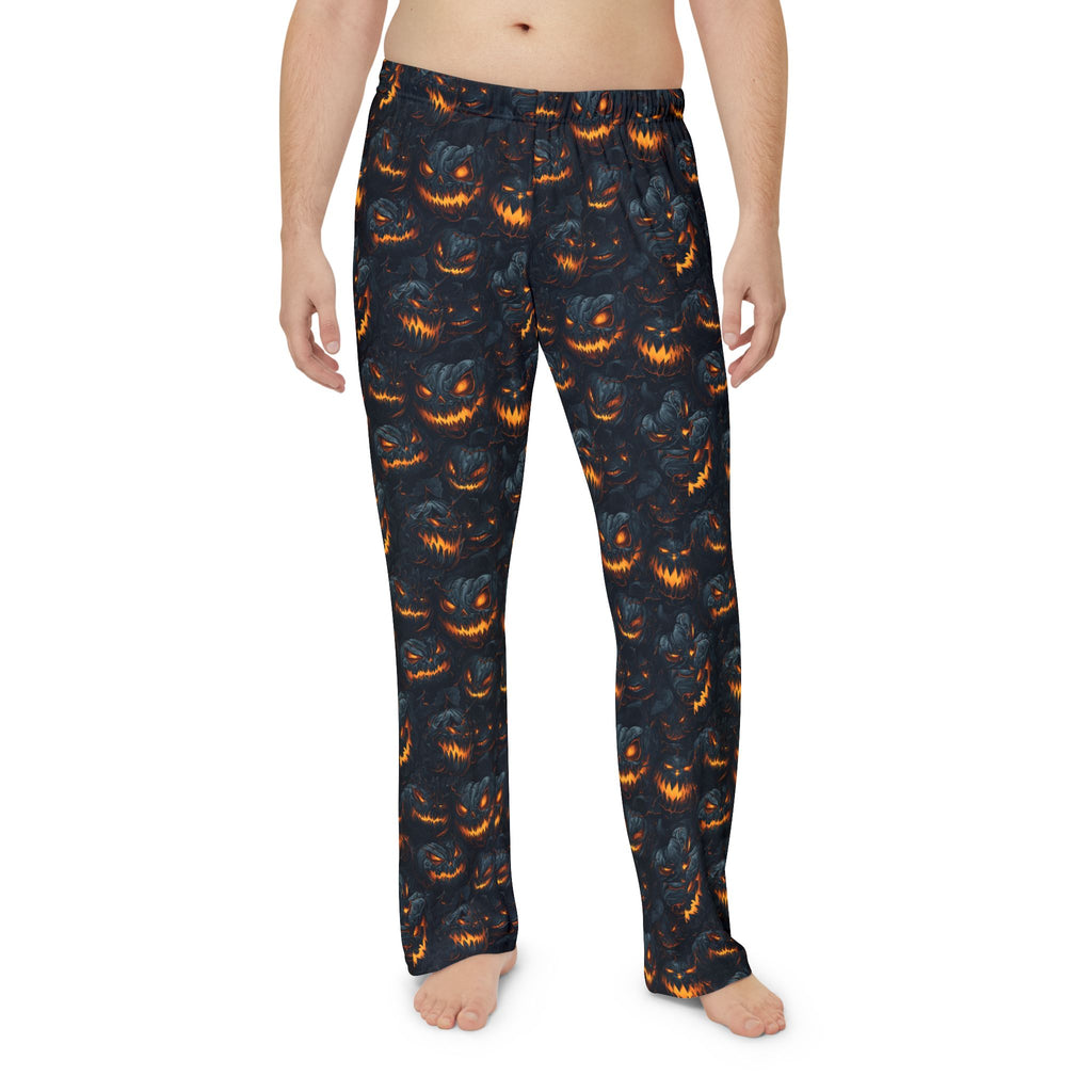 Men's pumpkin pajama pants worn, front view