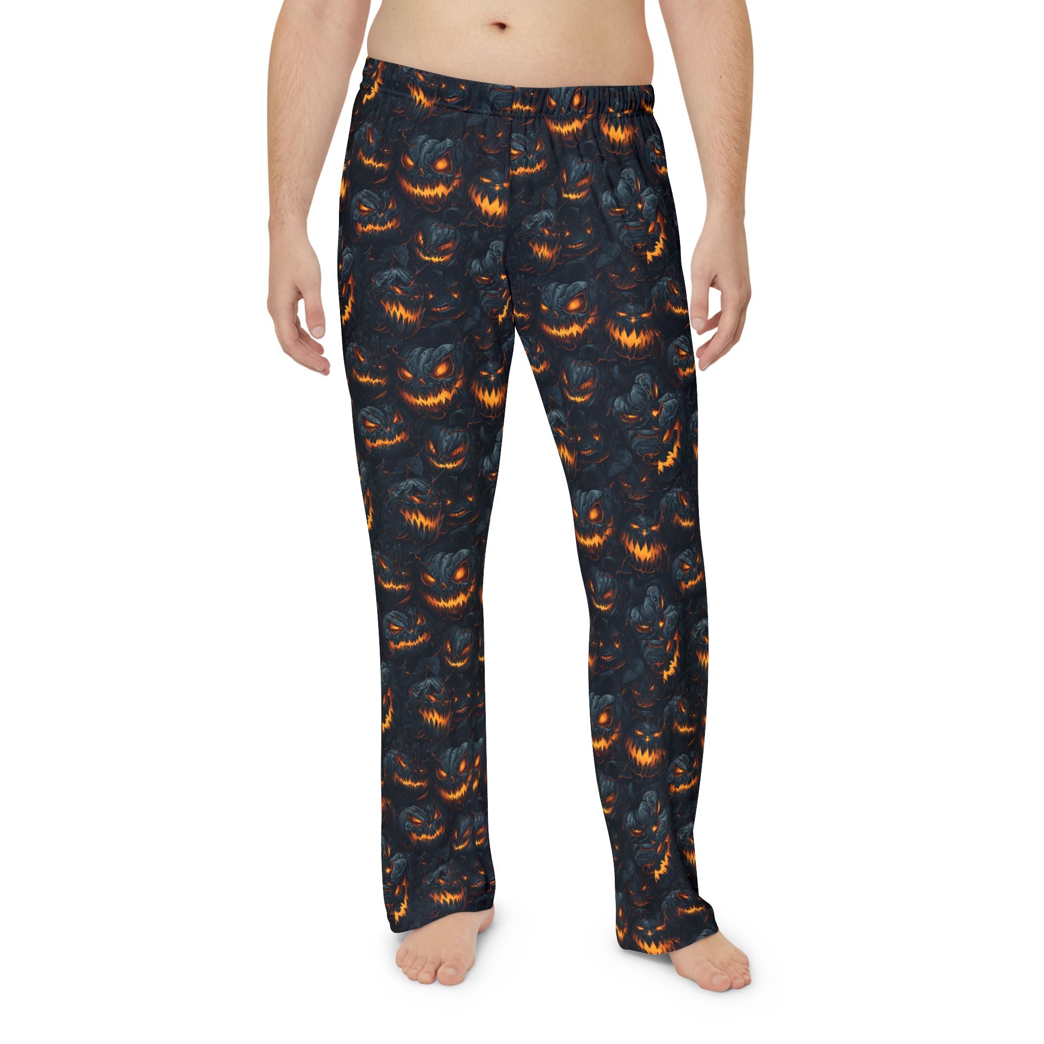 Men's pumpkin pajama pants worn, front view