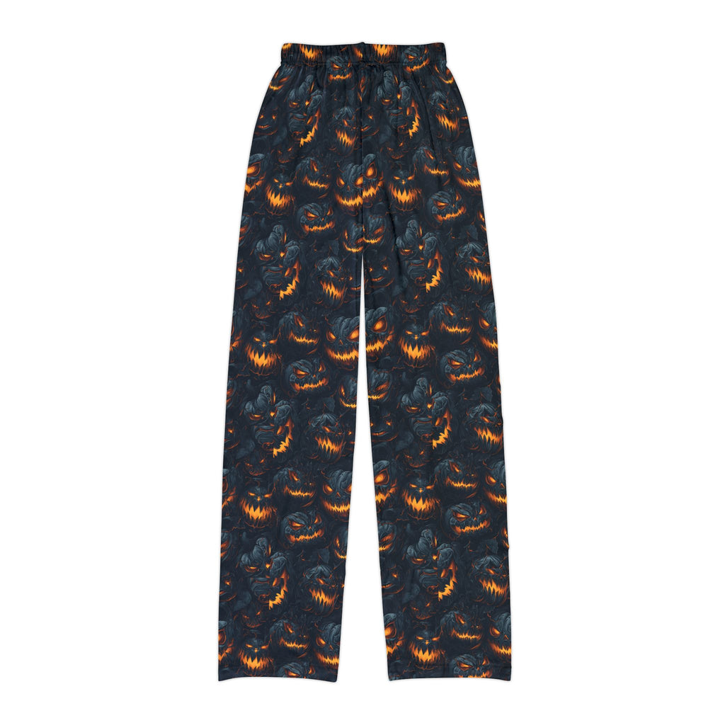 Close-up of kids pumpkin print pajama pants fabric